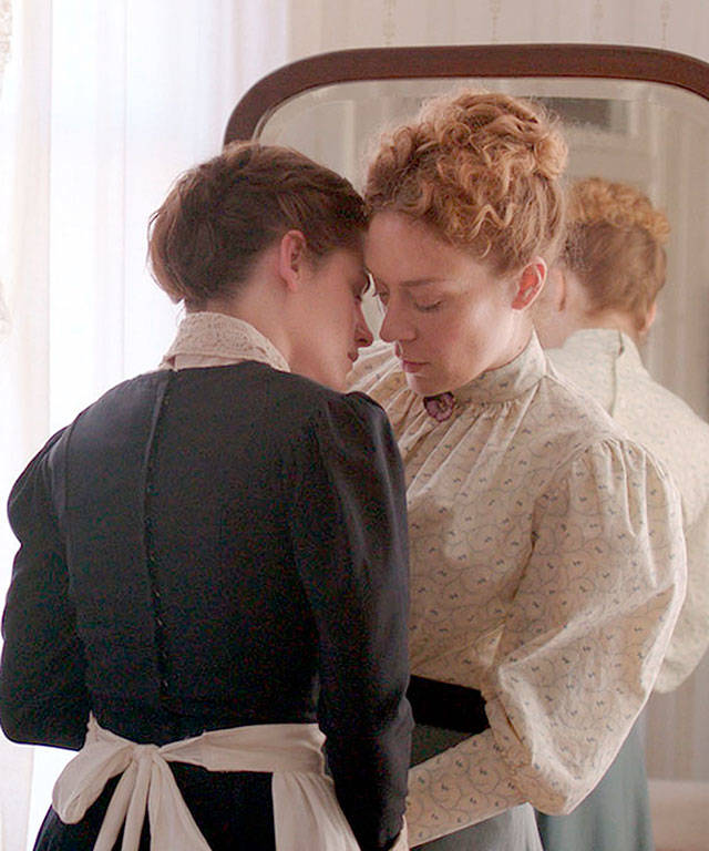 Forbidden passion erupts between maid Bridget Sullivan (Kristen Stewart, left) and Lizzie Borden (Chloe Sevigny) in “Lizzie.” (Roadside Attractions)
