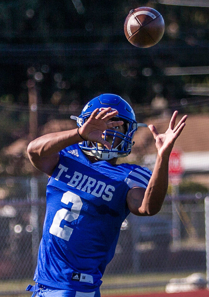 Shorewood receiver Jaro Rouse catches a pass during practice Wednesday afternoon at Shorewood High School in Shoreline. (Olivia Vanni / The Herald)
