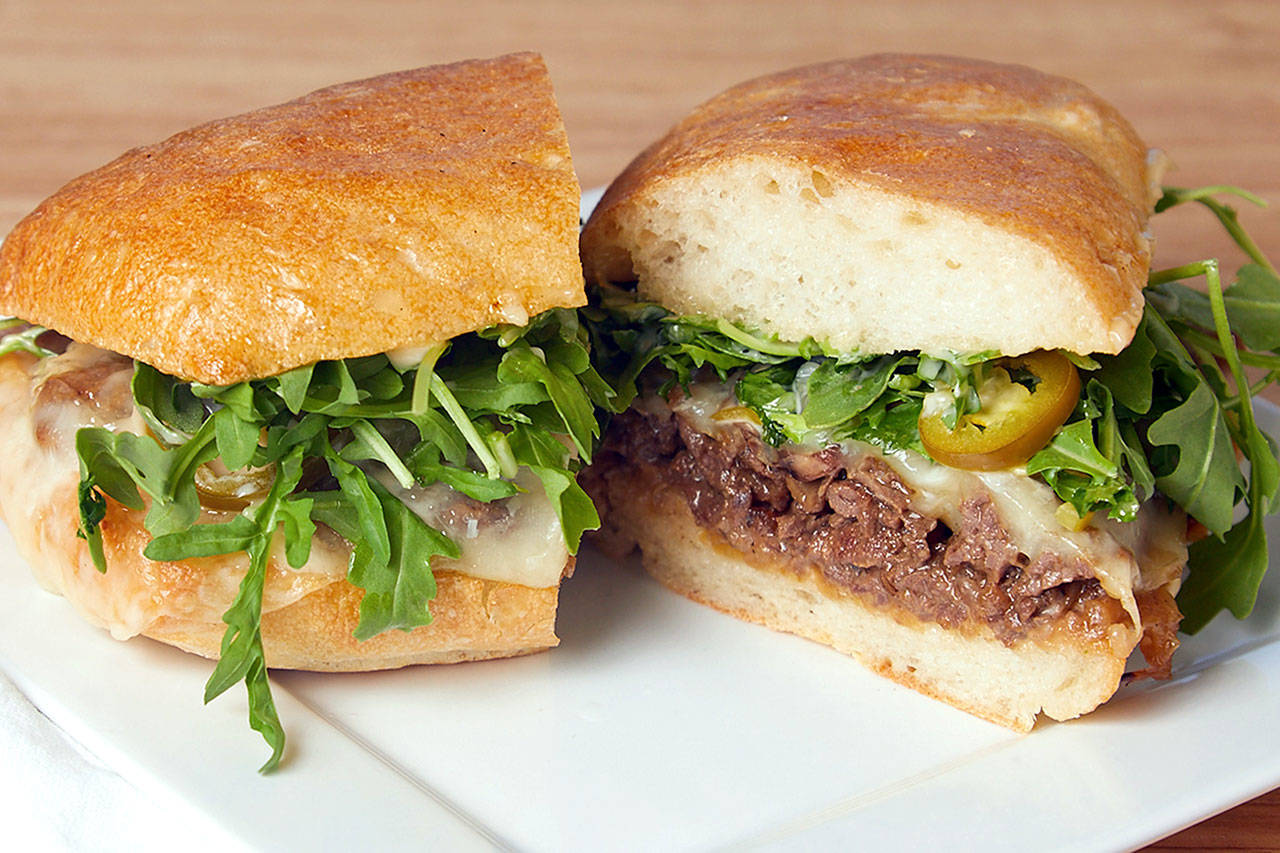 Everett’s 9 Delicacies makes a beef bulgogi melt with caramelized onion, pickled sweet pepper, portobello mushroom, provolone, arugula, jalapenos, hoisin aioli on ciabatta bread. (9 Delicacies)