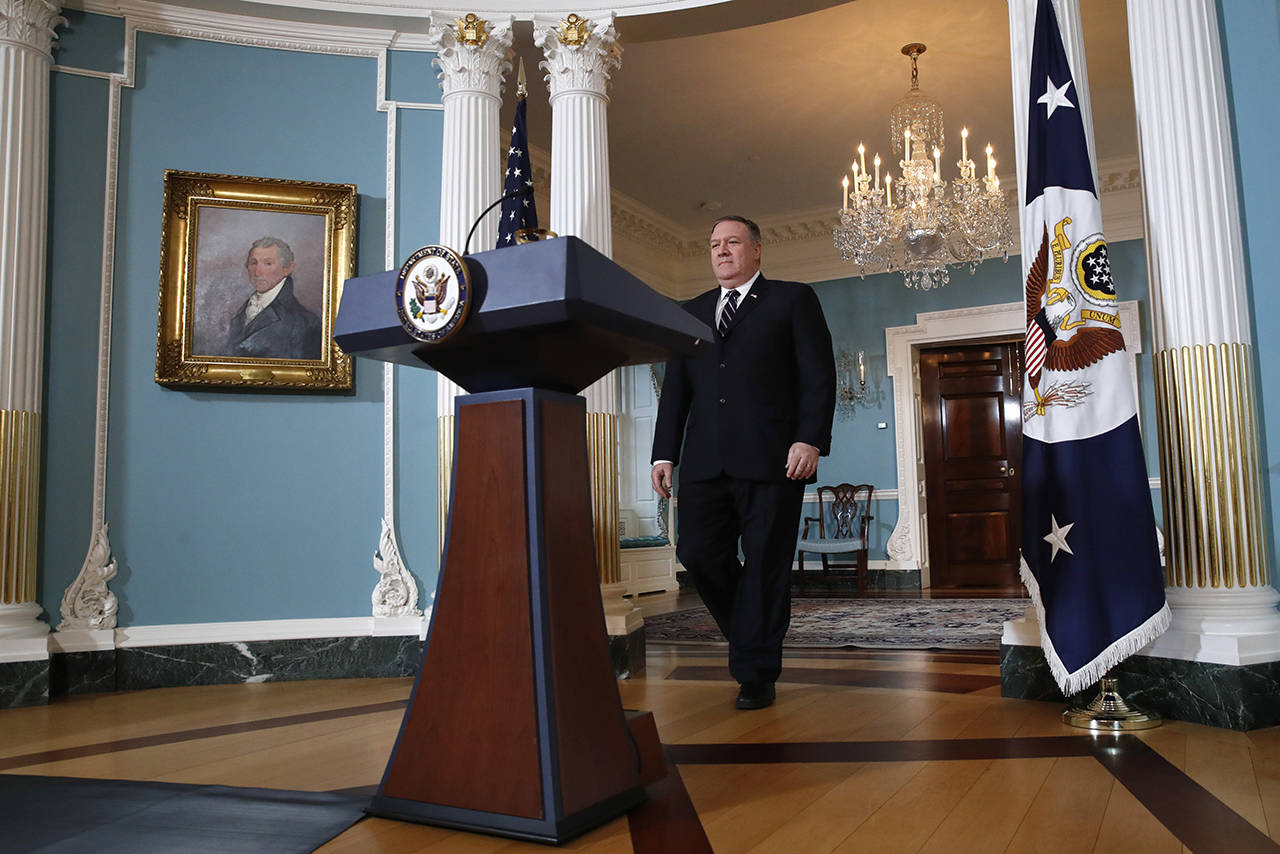 Secretary of State Mike Pompeo walks toward the podium to make a statement about refugees to the media Monday at the State Department in Washington. (AP Photo/Jacquelyn Martin)