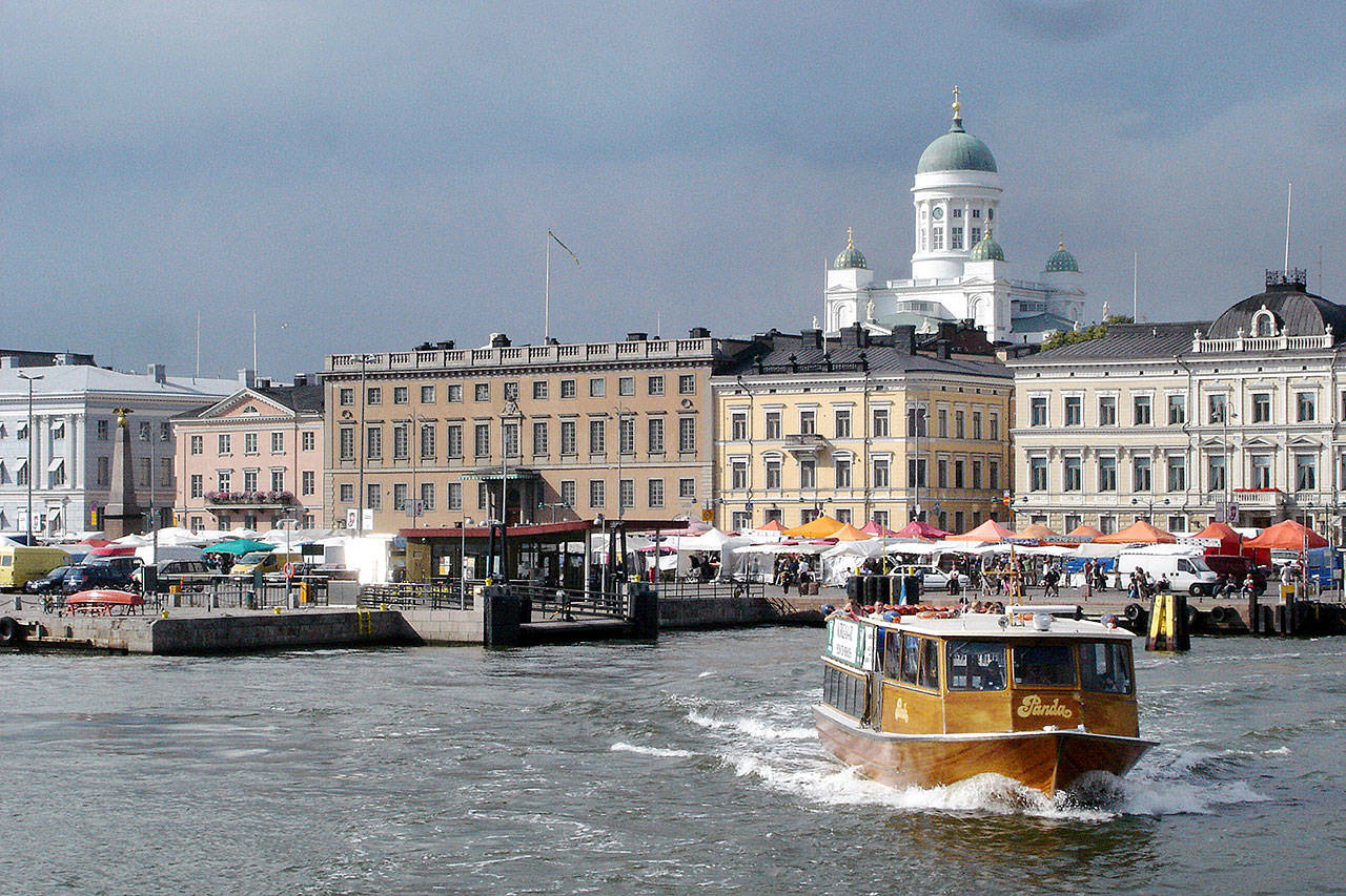 Helsinki grew up around its busy harbor, overlooked by the gleaming white Lutheran Cathedral. (Rick Steves / Rick Steves Europe)
