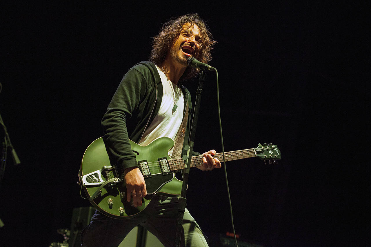 In this 2013 photo, Chris Cornell of Soundgarden performs at Rock on the Range in Columbus, Ohio. New Chris Cornell music is being released more than a year after his death. Cornell’s widow Vicky is behind the new album “Chris Cornell,” as well as a four-disc box set. Both will be released Nov. 16, 2018. (Photo by Barry Brecheisen/Invision/AP, File)