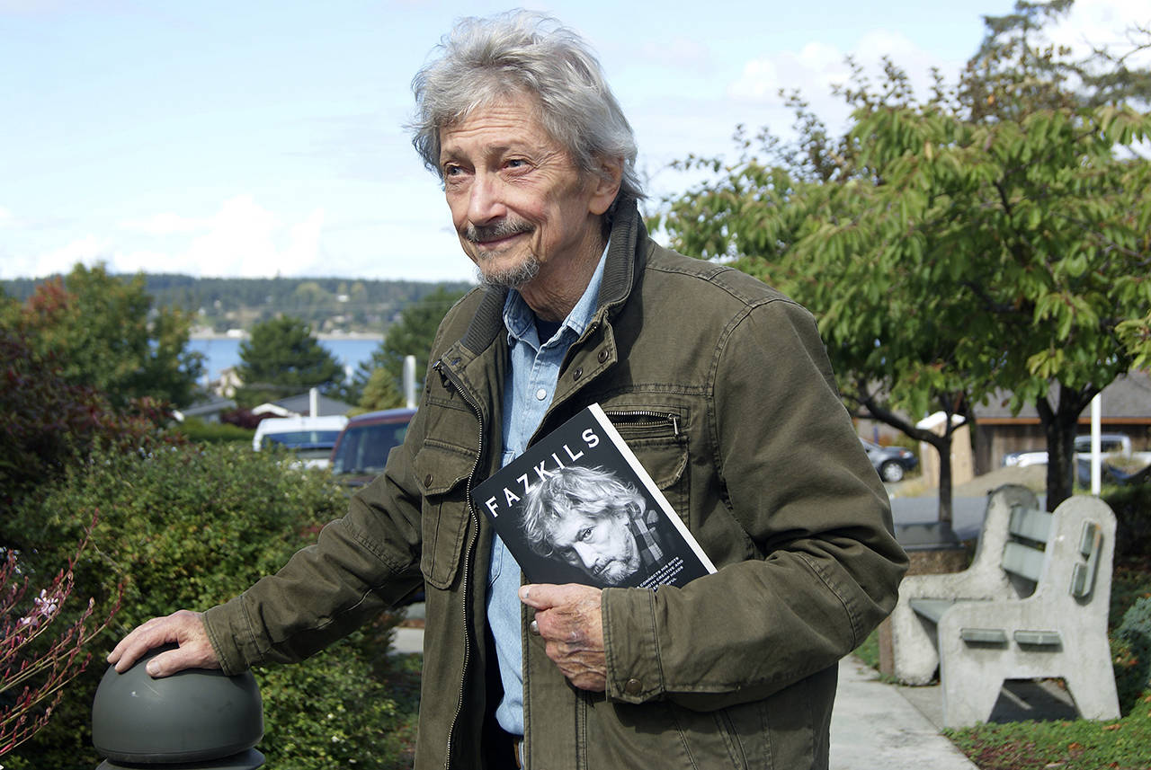 Whidbey Island resident Dick Evans will be signing and selling copies of his book, “Fazkils,” at the Clinton Community Hall on Saturday. (Maria Matson / Whidbey News-Times)