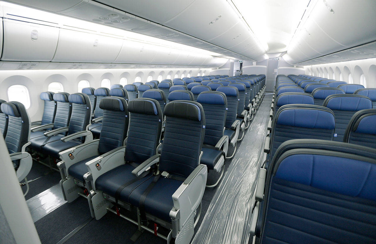 Economy class seating is shown on a new United Airlines Boeing 787-9 undergoing final configuration and maintenance work at Seattle-Tacoma International Airport in 2016. (AP Photo/Ted S. Warren, File)