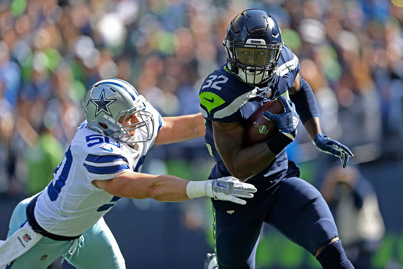 Seahawks keep feeding the ball to ‘tired’ Chris Carson