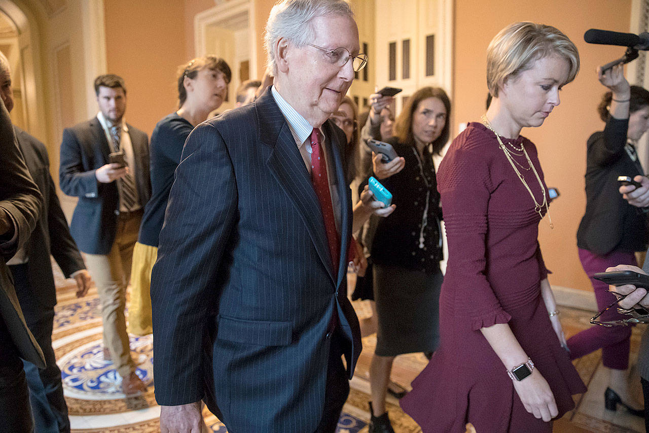 Senate Majority Leader Mitch McConnell, R-Kentucky, returns to his office after speaking on the Senate floor about Supreme Court nominee Brett Kavanaugh on Capitol Hill in Washington on Monday. (AP Photo/J. Scott Applewhite)