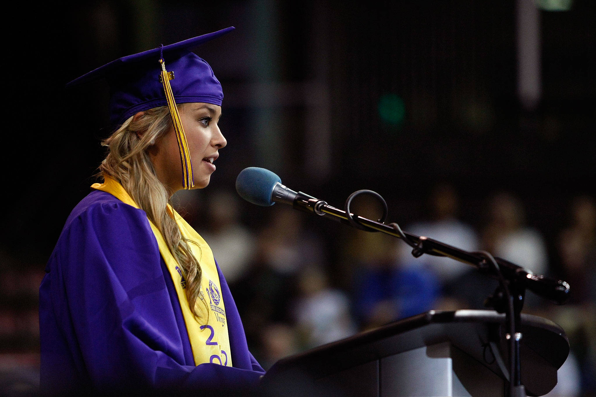 Ivy Jacobsen, now a Bothell police officer, spoke about being a survivor of sexual abuse at her graduation from Lake Stevens High School in 2014. (Photo by Ian Terry / Herald File)