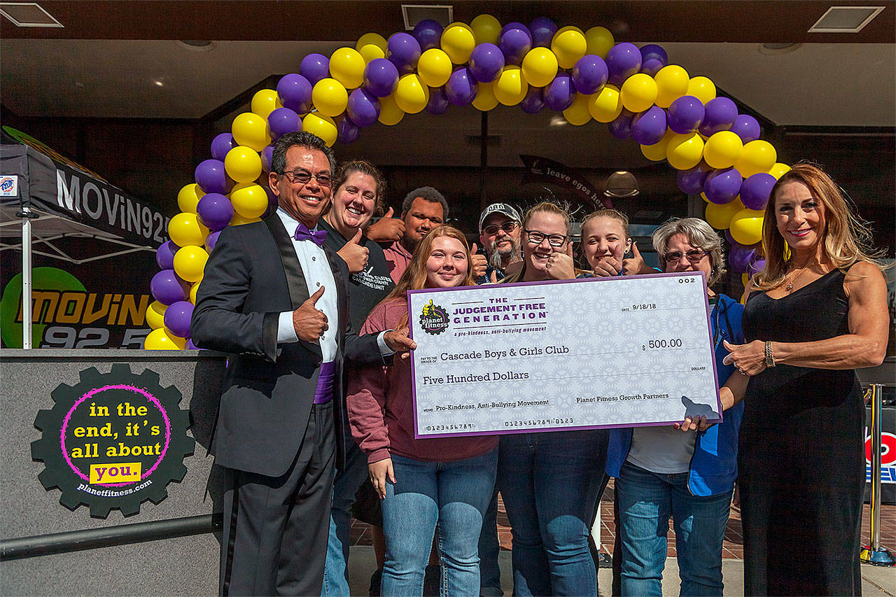 Planet Fitness in Everett celebrated its grand opening on Sept. 18 with a $500 donation to Cascade Boys & Girls Club. (Contributed photo by Leslie C. Saber)