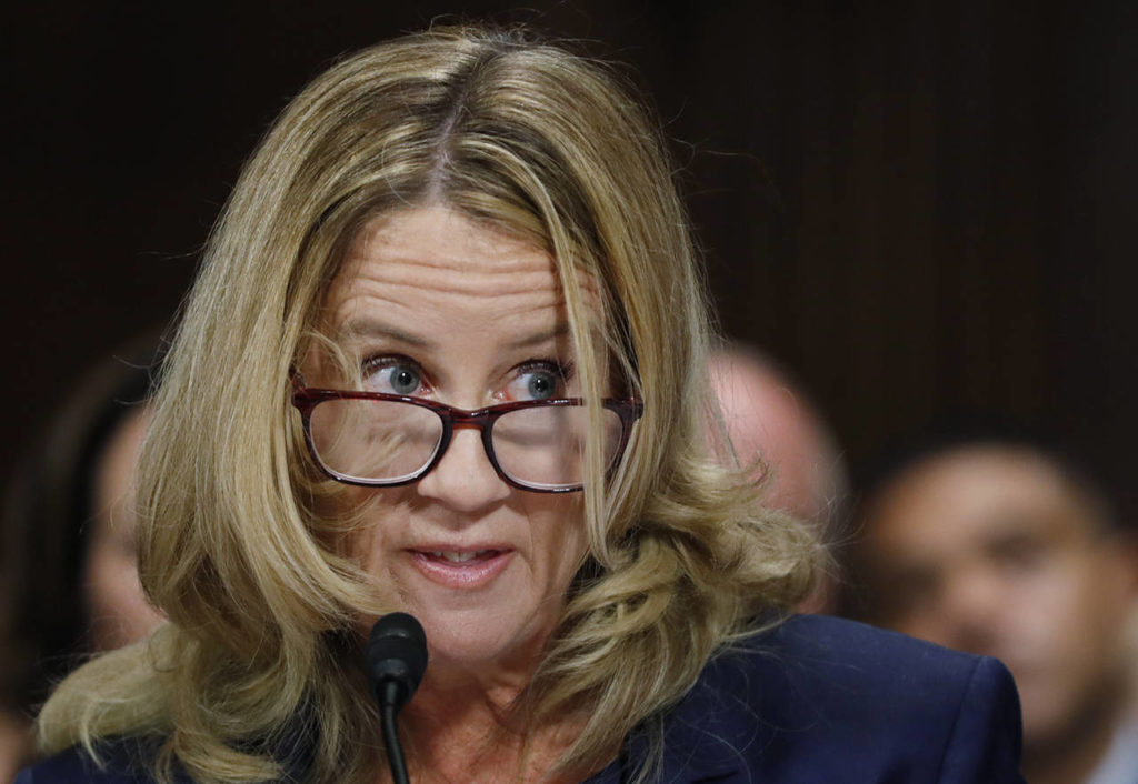 Christine Blasey Ford listens while testifying before a Senate Judiciary Committee hearing Thursday on Capitol Hill in Washington. (Jim Bourg/Pool Image via AP)
