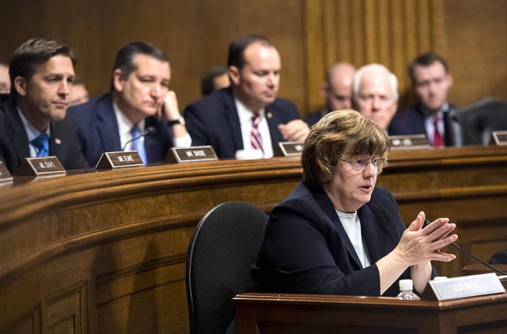 Phoenix prosecutor Rachel Mitchell questions Christine Blasey Ford as Senators, from left, Sen. Ben Sasse, R-Neb., Sen. Ted Cruz, R-Texas, Sen. Mike Lee, R-Utah., and Sen. John Cornyn, R-Texas, listen during the Senate Judiciary Committee hearing, Thursday on Capitol Hill in Washington. (Tom Williams/Pool Image via AP)
