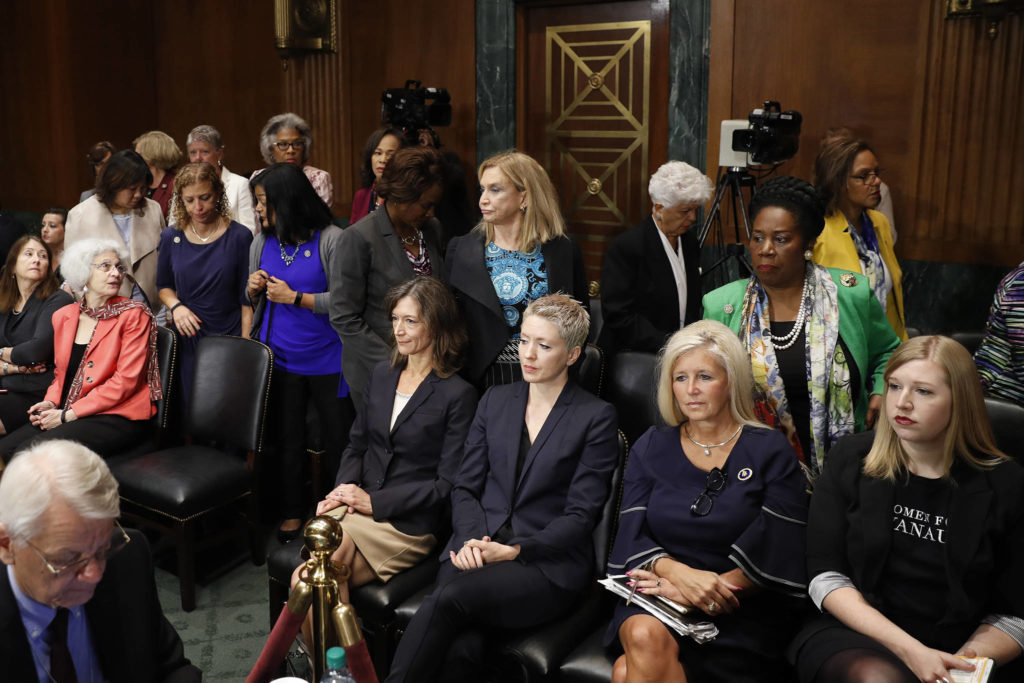 Female members of Congress walk out of a Senate Judiciary Committee meeting Friday on Capitol Hill in Washington. (AP Photo/Pablo Martinez Monsivais)

