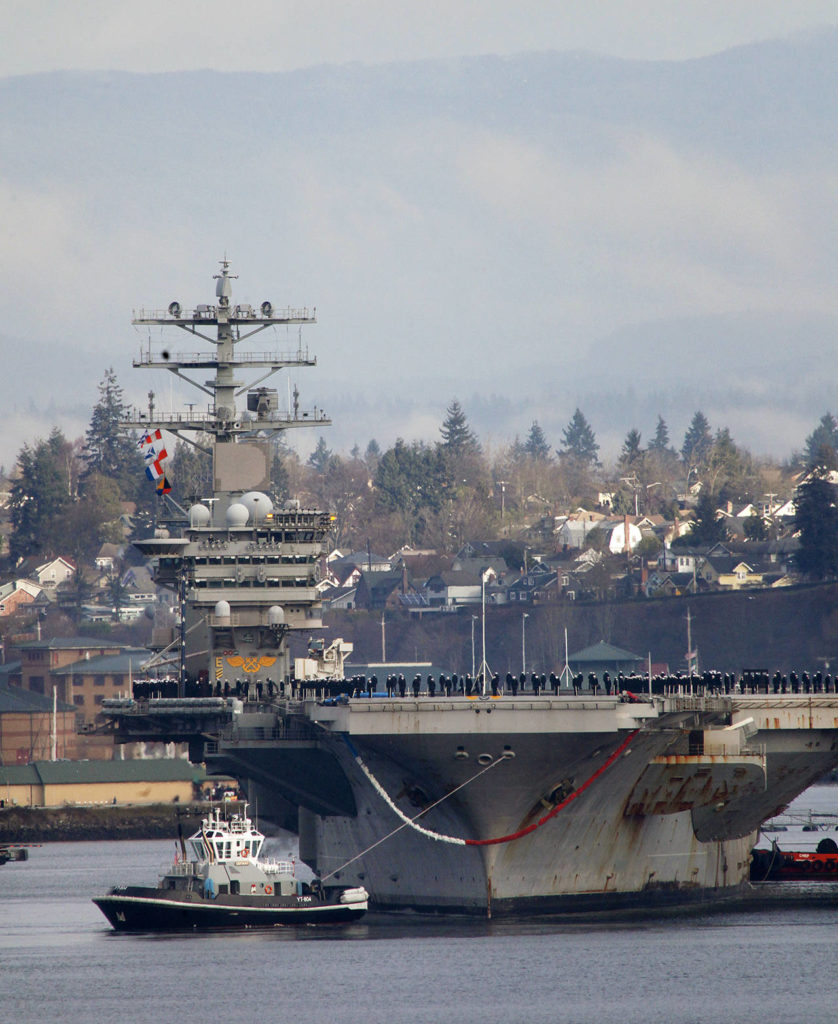The aircraft carrier USS Nimitz returned to Naval Station Everett on Dec. 16, 2013. (Dan Bates / Herald file)
