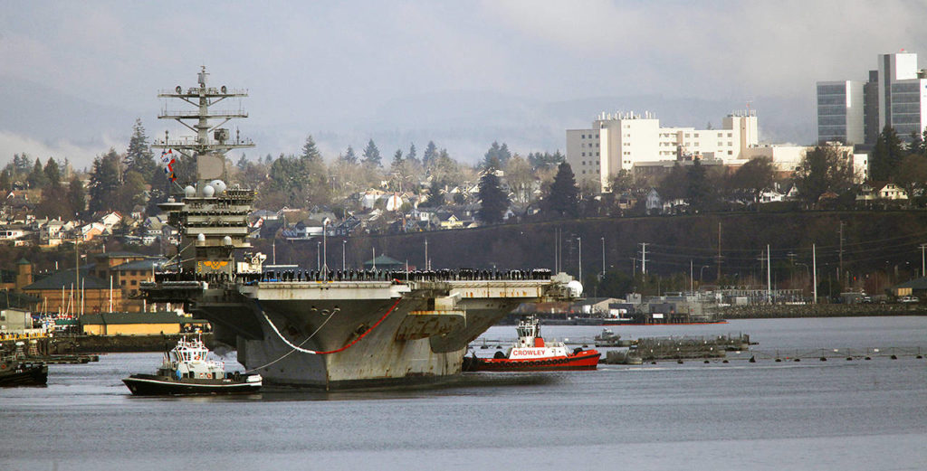 The aircraft carrier USS Nimitz returned to Naval Station Everett on Dec. 16, 2013. (Dan Bates / Herald file)
