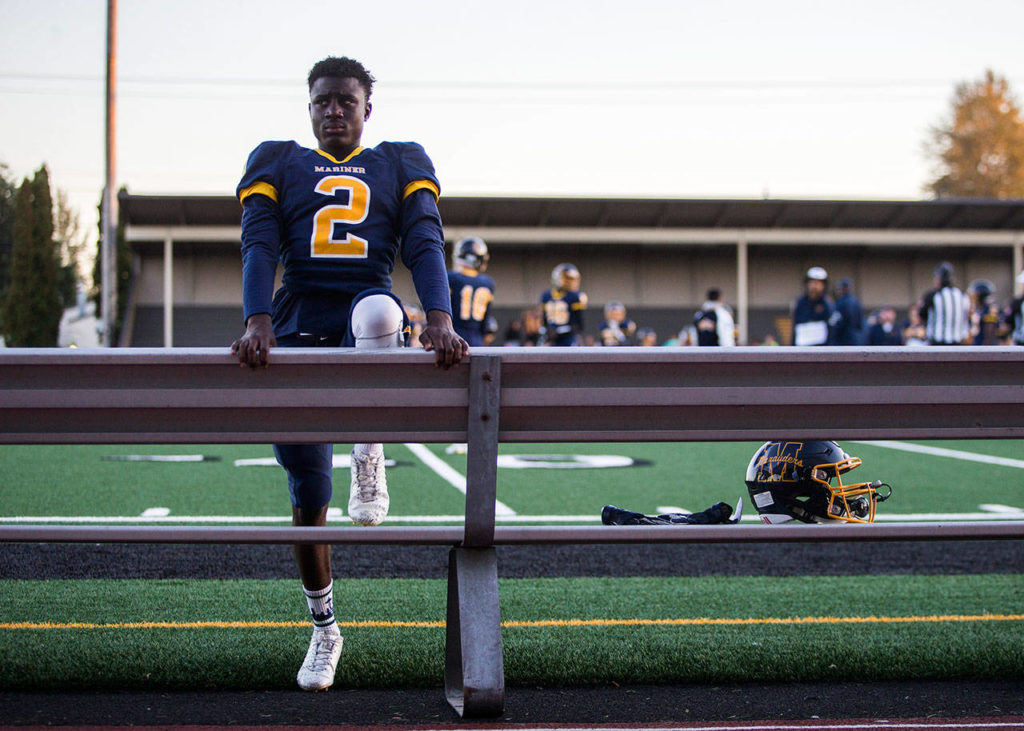 Mariner’s Prince Riley stretches before the game against Jackson. (Olivia Vanni / The Herald)
