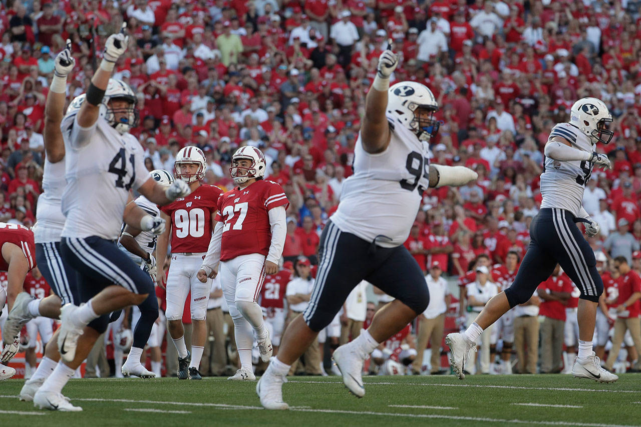 BYU players react after Wisconsin kicker Rafael Gaglianone missed a field goal in the final seconds of the second half of a game Sept. 15, 2018, in Madison, Wis. BYU won 24-21. (AP Photo/Morry Gash)