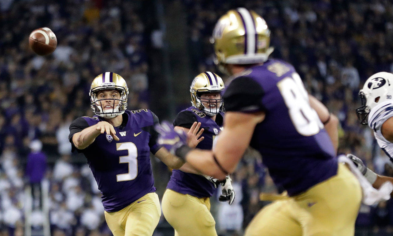 Washington quarterback Jake Browning (3) passes to tight end Drew Sample (right) for a touchdown against BYU during the second half of a game on Sept. 29, 2018, in Seattle. (AP Photo/Ted S. Warren)