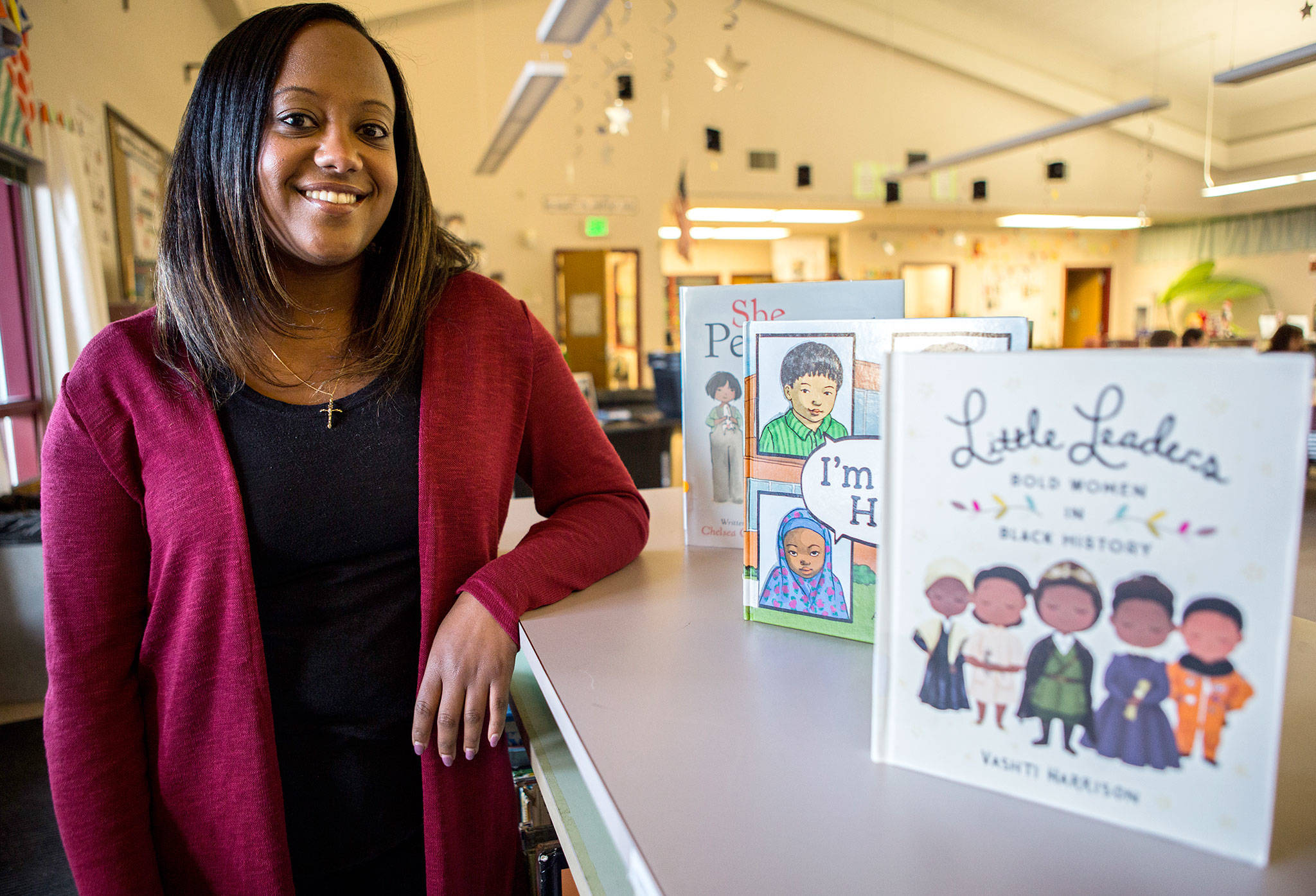 Nardos Habtemicael, first grade teacher at Challenger Elementary School, received a grant to create a diversity bookshelf at the library. (Olivia Vanni / The Herald)