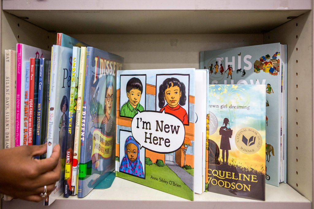 Samples of books on the diversity bookshelf in the Challenger Elementary School library. (Olivia Vanni / The Herald)
