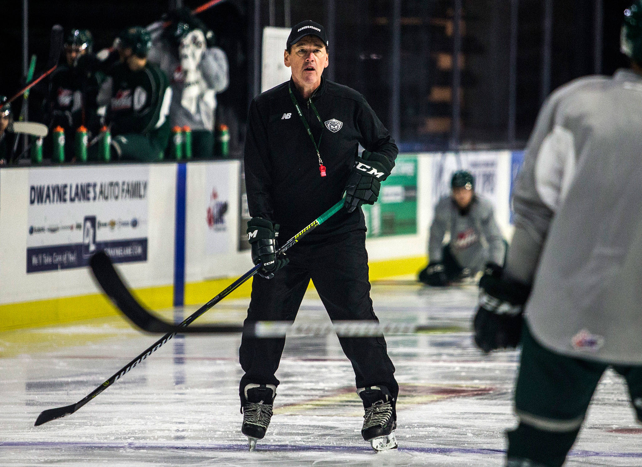 Silvertips assistant coach Harry Mahood directs a drill during practice on Oct. 3, 2018, in Everett. (Olivia Vanni / The Herald)