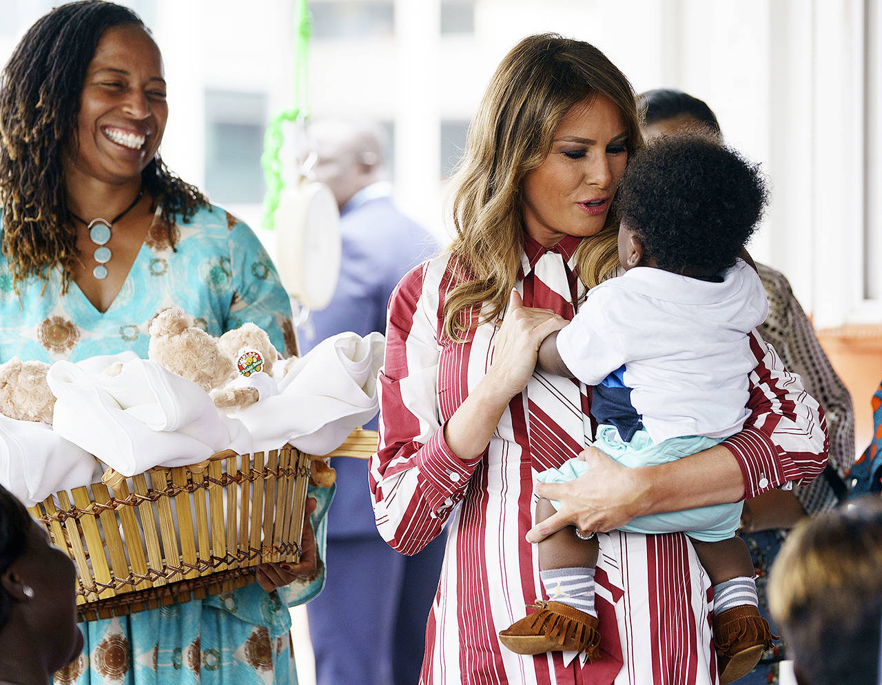 First lady Melania Trump holds a baby as she visits Greater Accra Regional Hospital in Accra, Ghana, on Tuesday. (AP Photo/Carolyn Kaster)