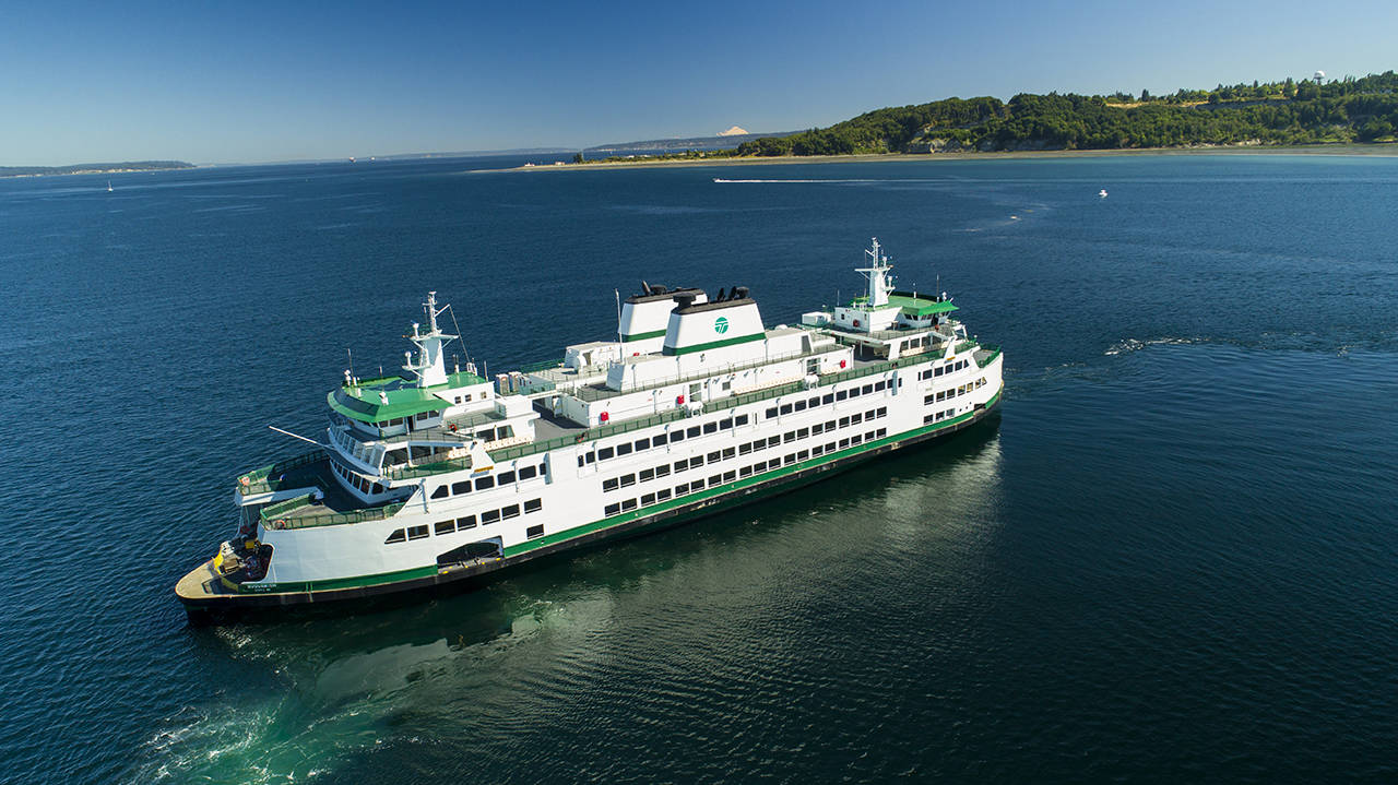 Suquamish shipbuilder Vigor took the new vessel out on sea trials in July 2018. In this photo, the Olympic class ferry is in Elliott Bay with Seattle’s Discovery Park in the background. (Washington State Ferries)