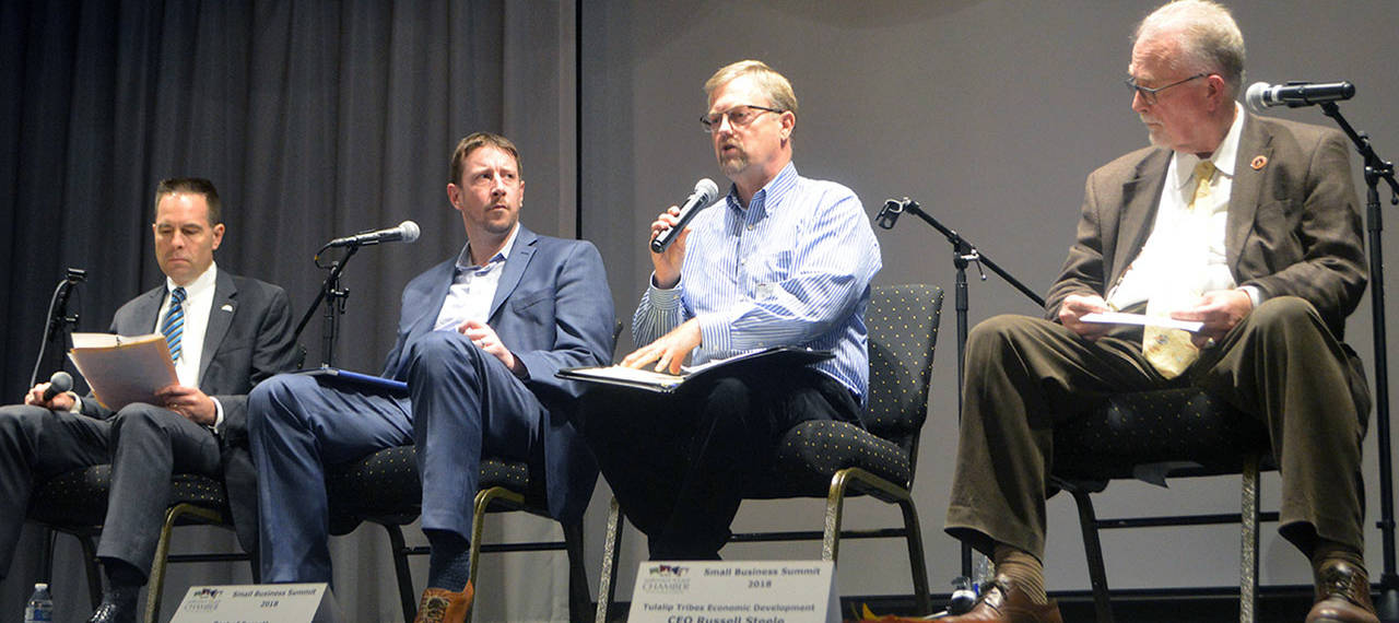 From left, Marysville Mayor Jon Nehring, Economic Alliance of Snohomish County President and CEO Patrick Pierce, Port of Everett Chief Financial Officer John Carter and Tulalip Economic Development Corporation CEO Russell Steele speak on a panel during the Business Summit on Oct. 2. (Steven Powell / The Marysville Globe)
