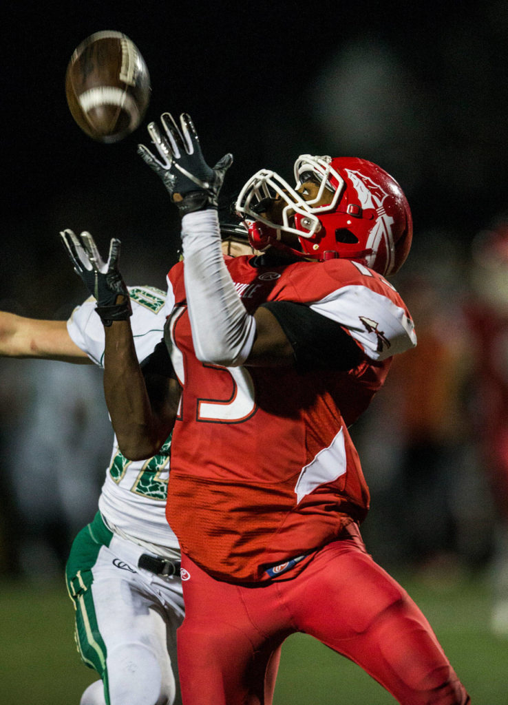 Marysville Pilchuck’s Bryan Sanders intercepts a pass during the game on Oct. 5 in Marysville. (Olivia Vanni / The Herald)
