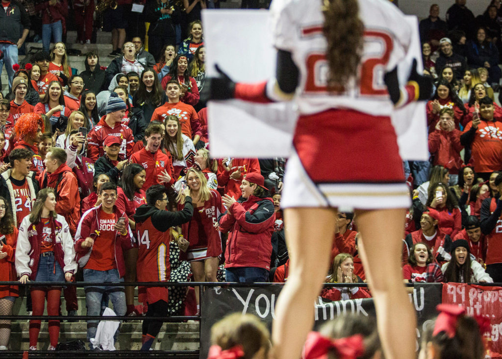 The student section reacts to a homecoming ask during the game on Oct. 5 in Marysville. (Olivia Vanni / The Herald)
