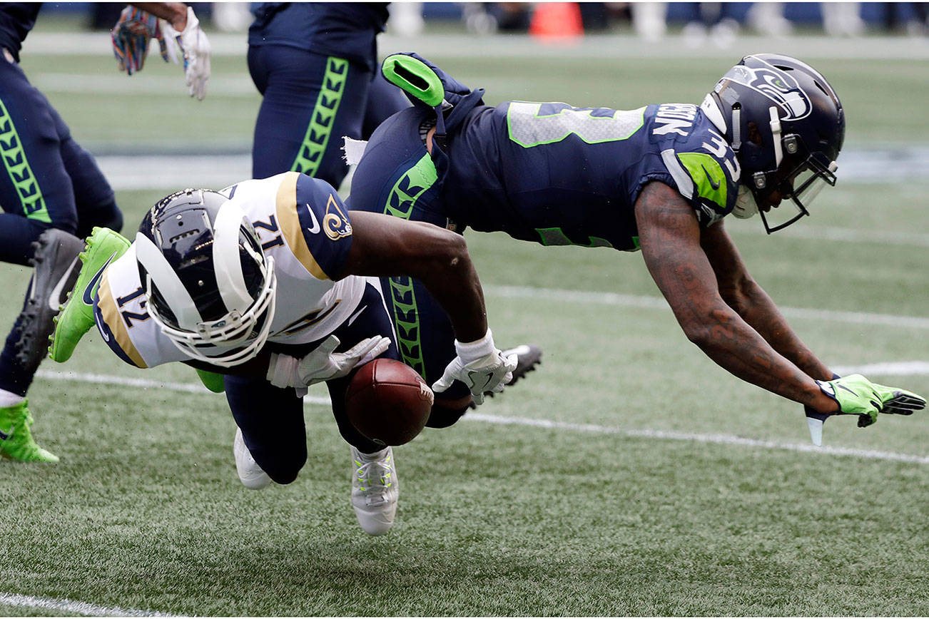 Rams hold off the Seahawks 33-31 to remain undefeated