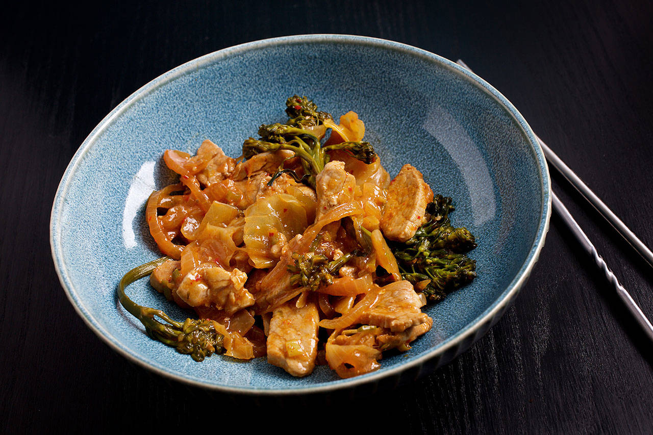 Pork and broccolini stir-fry with kimchi comes together in a flash, making it an ideal weeknight dinner. (Deb Lindsey / For the Washington Post)