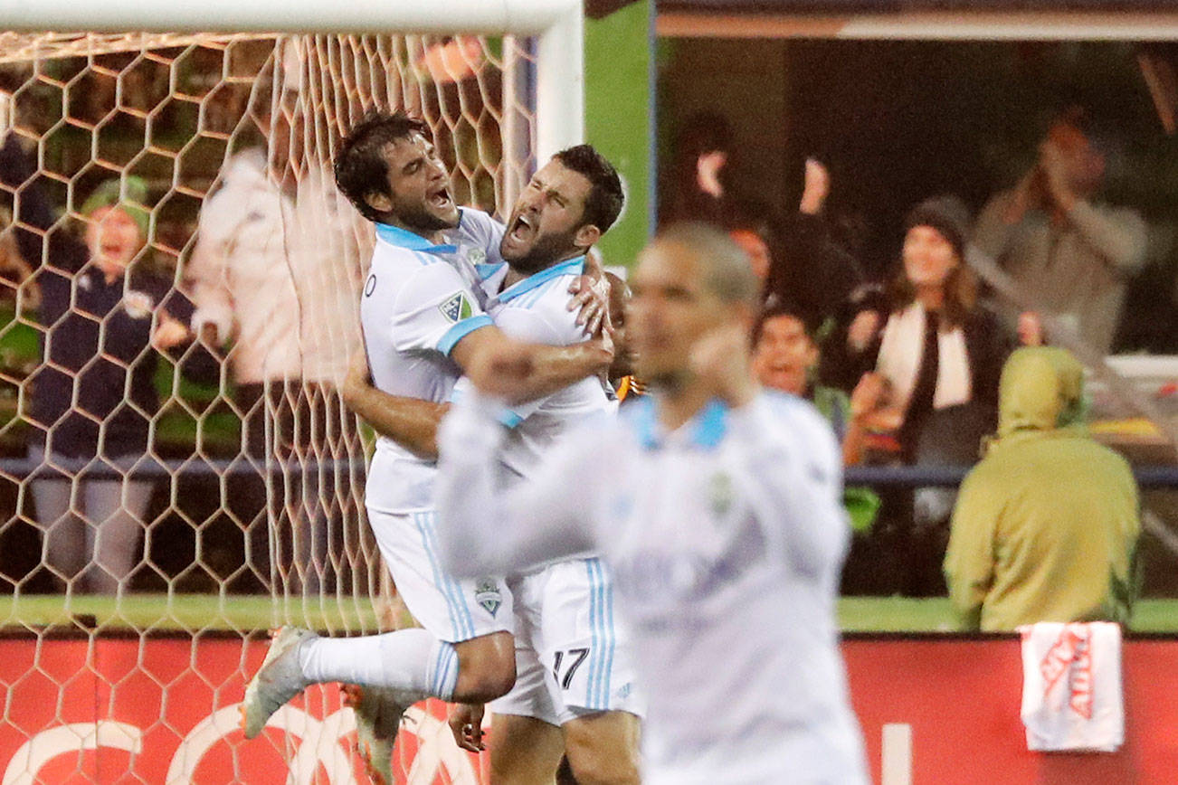 Rodriguez scores twice as Sounders down Houston, 4-1