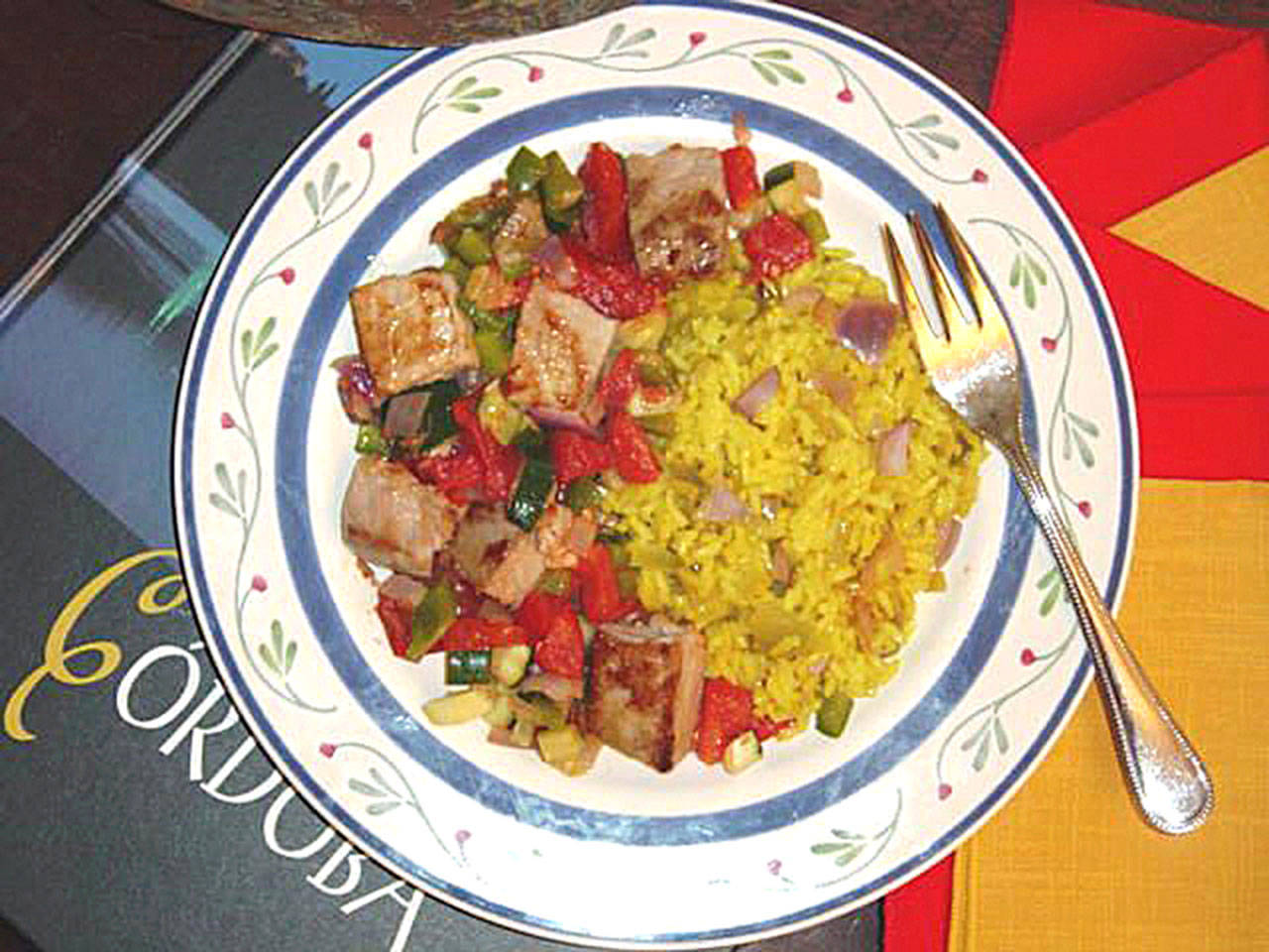 Spanish tuna and zucchini with yellow rice a taste of Galician coastline. (Linda Gassenheimer)