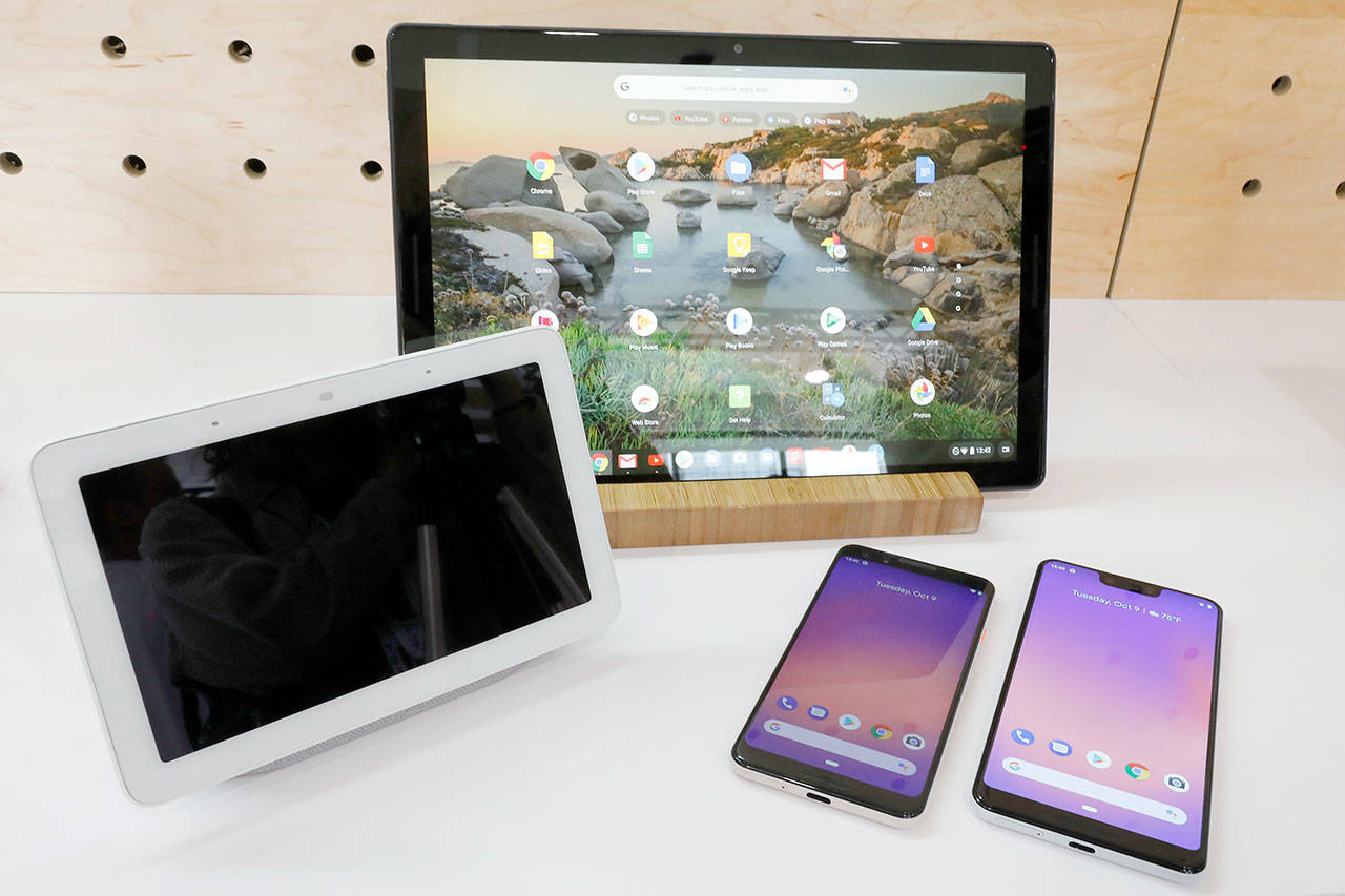Google’s new devices — from left, the Google Home Hub, the Pixel Slate and two new smartphones — were rolled out Tuesday. (Associated Press)