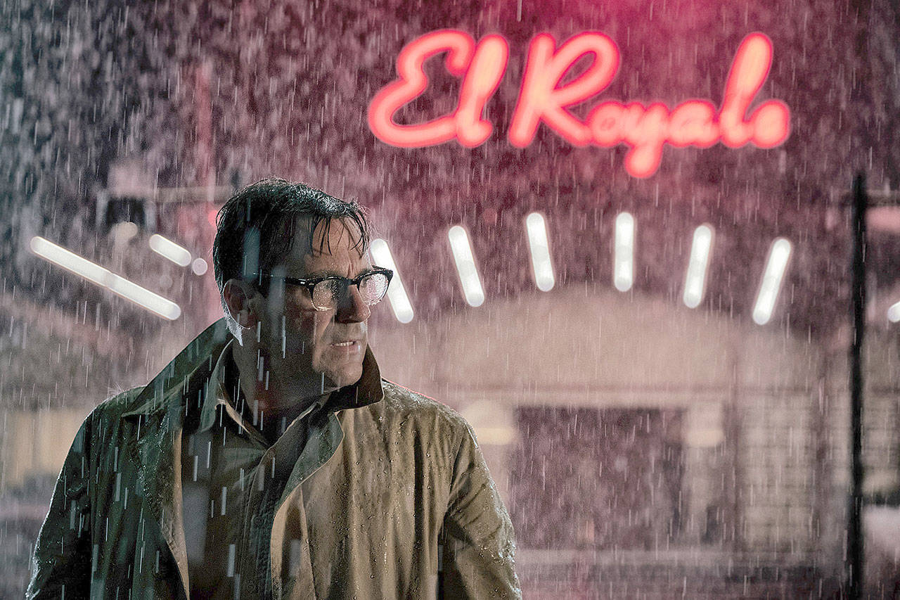 Jon Hamm plays a traveling salesman who apparently forgot to pack a hat in “Bad Times at the El Royale.” (Twentieth Century Fox)