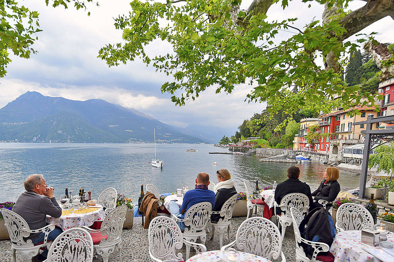 The town of Varenna on Lake Como is the perfect place to savor a lakeside meal or aperitivo. (Cameron Hewitt / Rick Steves’ Europe)