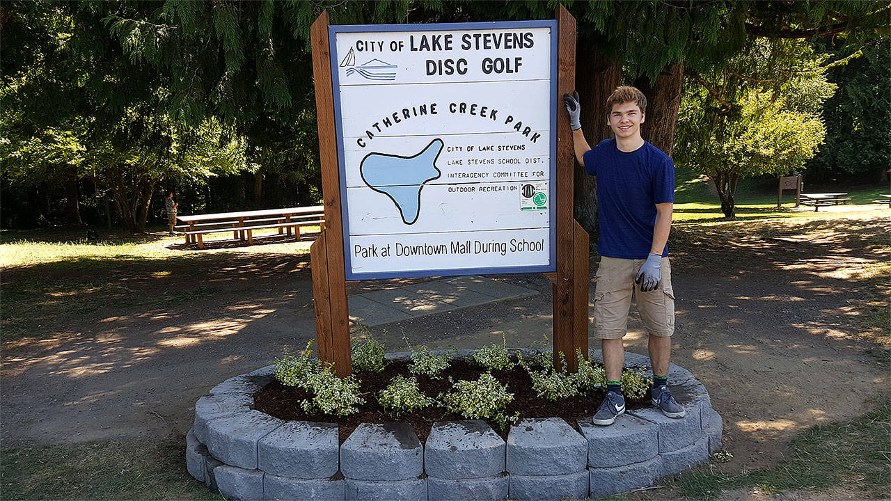 Marysville Boy Scout Kevin Mulvaney helped rebuild the park sign at Lake Stevens Disc Golf Course as part of his work to earn the Eagle Scout Award. (Contributed photo)