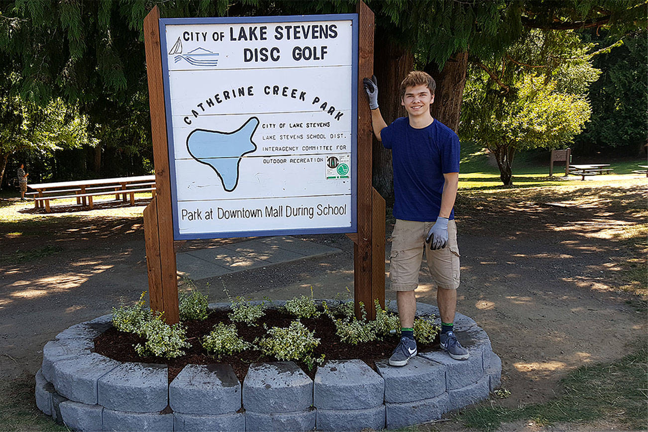 Boy Scout rehabilitates disc golf sign for Eagle project