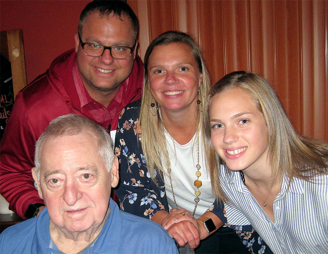 Steve Peterson (lower left) was honored as the Arlington Kiwanis Person of the Year at the Kiwanis Installation Banquet on Oct. 3, 2018. He is pictured with his son and daughter-in-law Scott and Nikki Peterson and his granddaughter Emily. (Contributed photo)