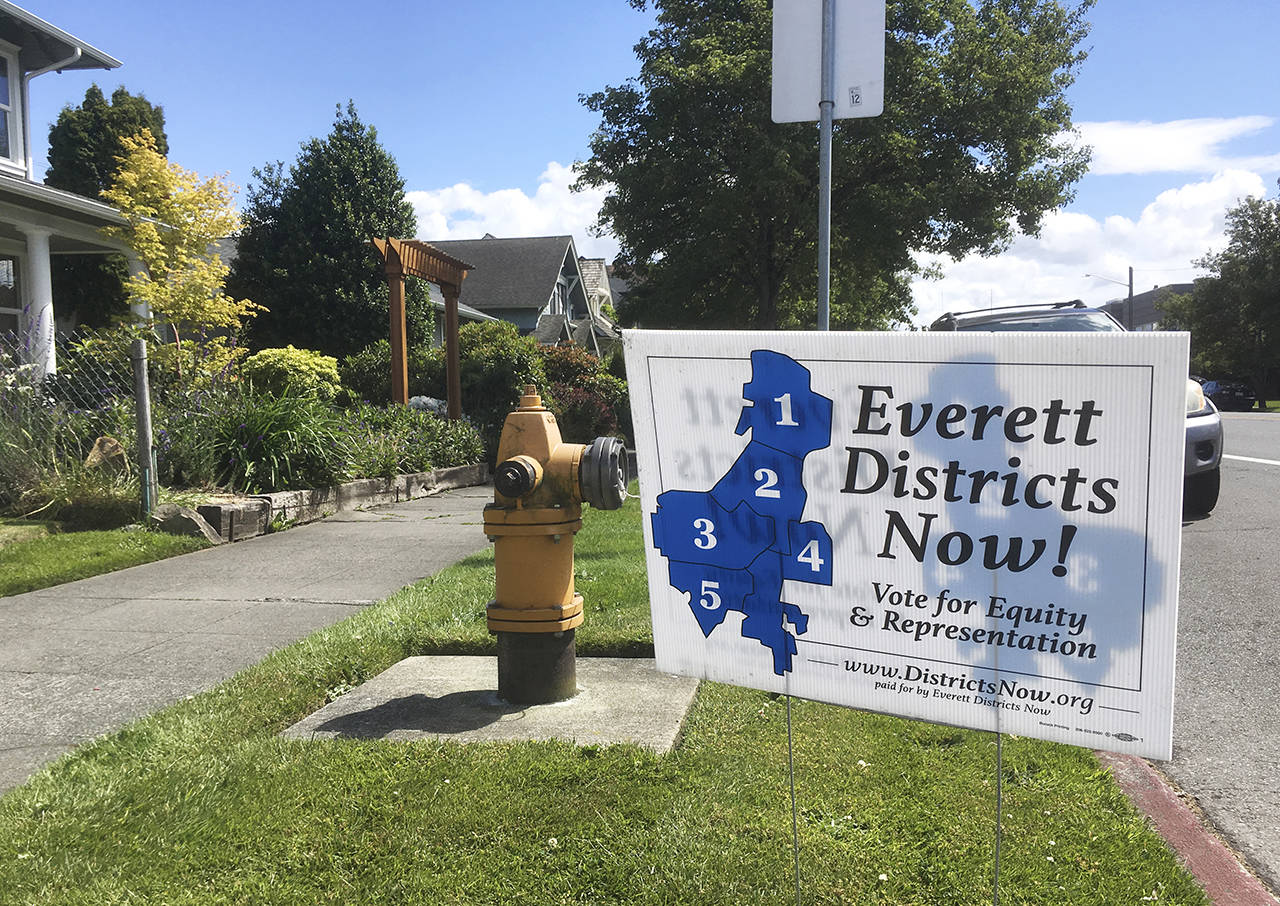 If Proposition 1 is approved, the city would be split into districts, and some council seats would be chosen directly from those areas. (Sue Misao / Herald file)