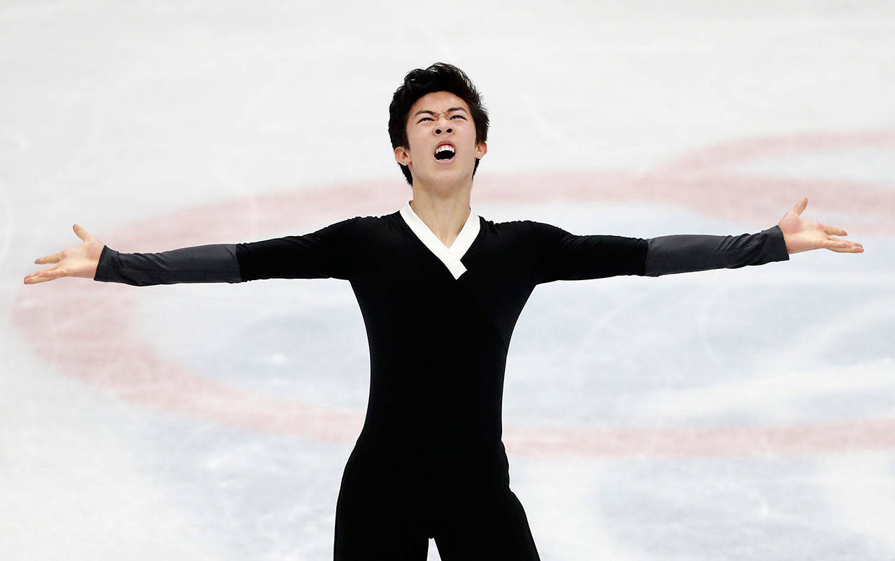 United States’ Nathan Chen celebrates after performing during men’s free skating at the Figure Skating World Championships in Assago, near Milan, Saturday, March 24, 2018. (AP Photo/Antonio Calanni)