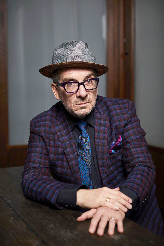 Music legend Elvis Costello poses for a portrait at The Redbury New York hotel in New York to promote his latest release “Look Now.” (Matt Licari/Invision)
