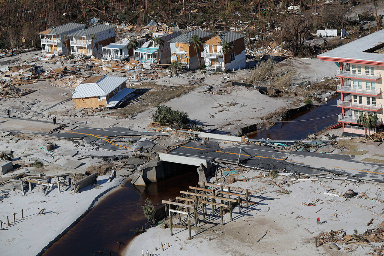 This photo shows devastation from Hurricane Michael in this aerial photo Friday over Mexico Beach, Florida. Blocks and blocks of homes were demolished, reduced to piles of splintered lumber or mere concrete slabs, by the most powerful hurricane to hit the continental U.S. in nearly 50 years. (AP Photo/Gerald Herbert)