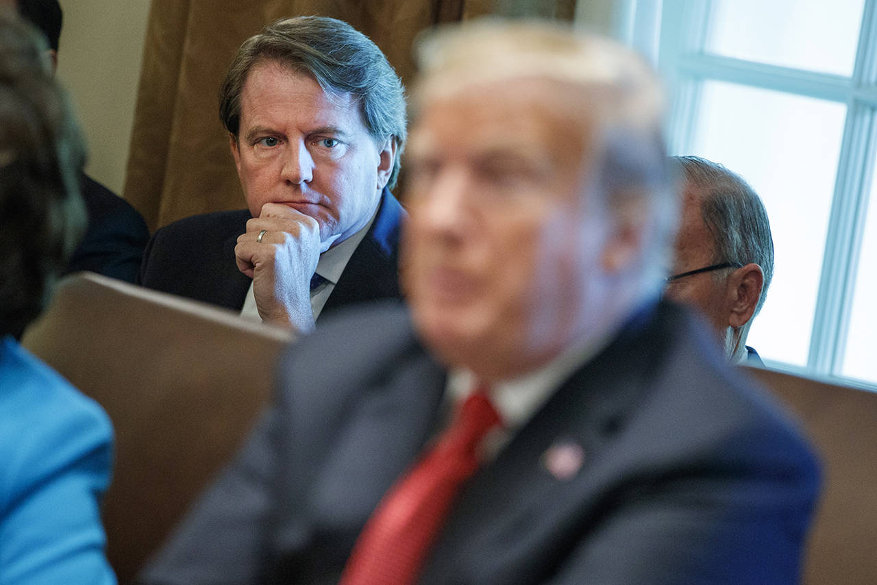 White House counsel Don McGahn looks on as President Donald Trump speaks during a cabinet meeting in the Cabinet Room of the White House on Wednesday. (AP Photo/Evan Vucci)