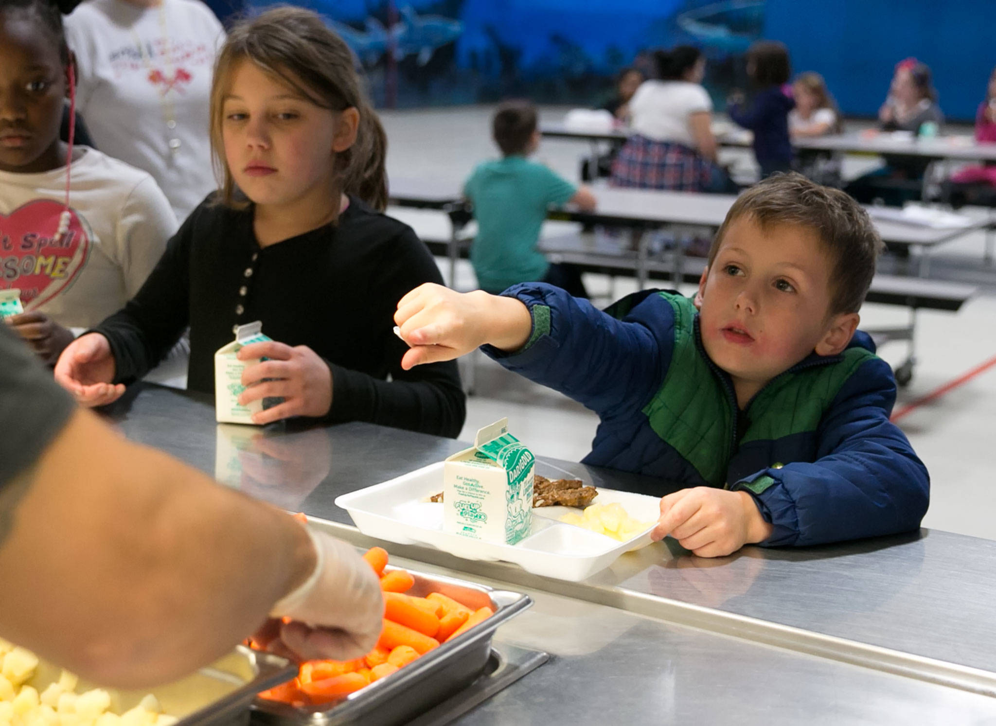 Aaron Riall-Conklin (right) asks a question with Sydney Mondares-Burke looking on Wednesday afternoon at Shoultes Elementary School in Marysville. (Kevin Clark / The Herald)
