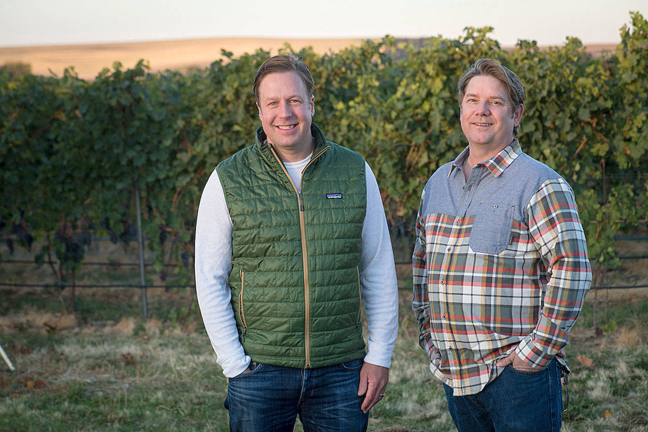 Scott Haladay (left) and his family purchased Walla Walla Vintners in 2017 and talented winemaker William vonMetzger (right) remains in the cellar of the iconic red barn. (Photo courtesy of Walla Walla Vintners)