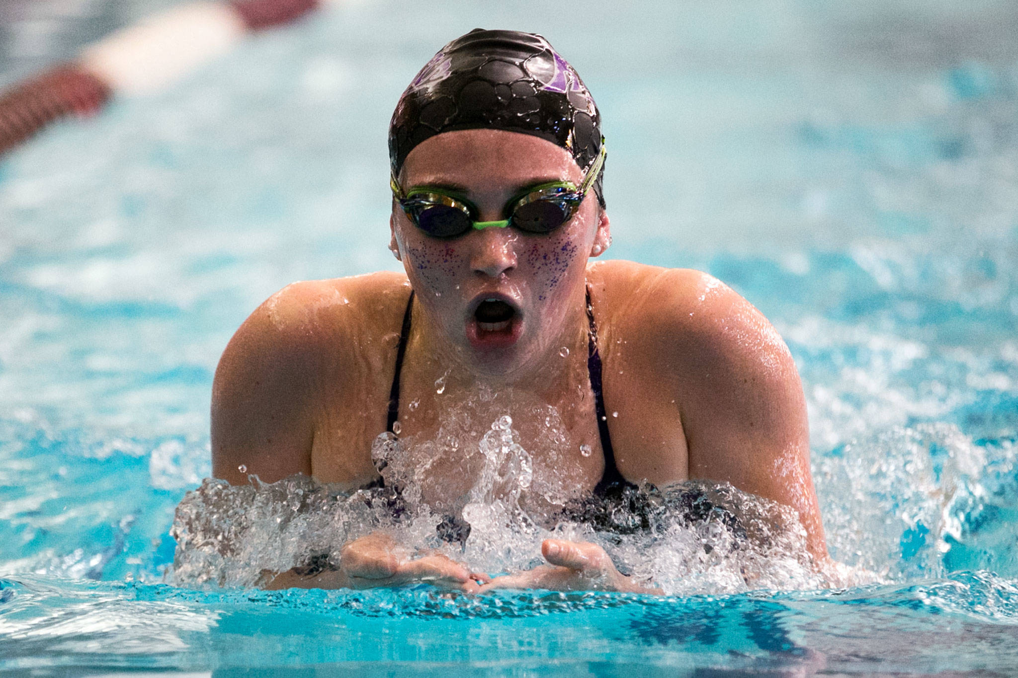 Kamiak’s Ava Collinge competes in the 200-yard individual medley event Thursday at Kamiak High School in Mukilteo. (Kevin Clark / The Herald)