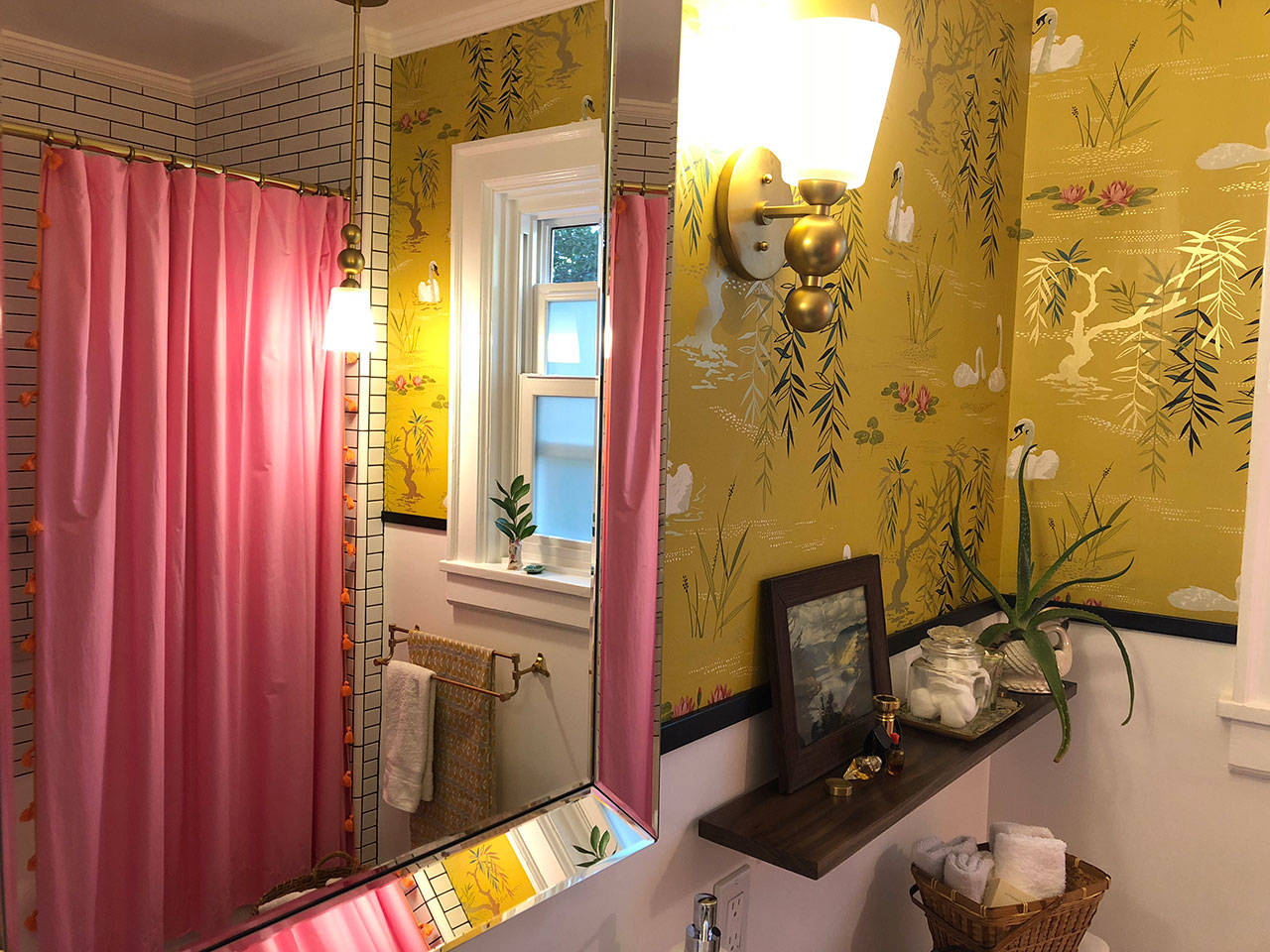 Extra lighting was a suggestion that we happily agreed to and gives the bathroom plants of light. (Aaron Swaney)