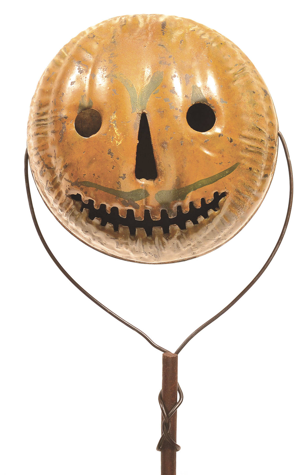 This tin 1910 Halloween parade torch sold for $1,888 at a Hess Auction Group auction a few year ago. It is 27 inches high. Halloween memorabilia is fourth in popularity with collectors, behind Christmas, Fourth of July and Easter. (Cowles Syndicate Inc.)