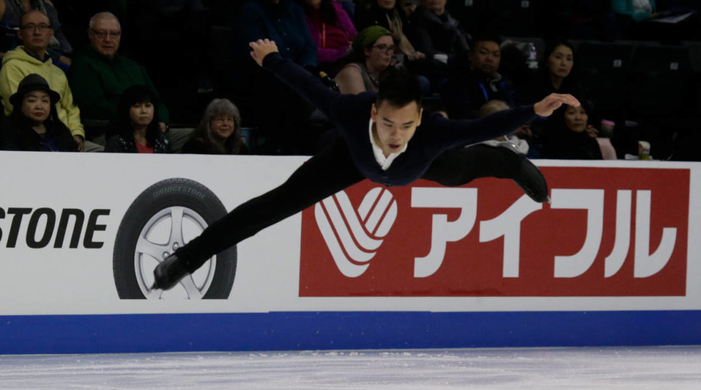 Nam Nguyen of Canada leaps at the 2018 Skate America competition Friday at Angel of the Winds Arena in Everett. (Andy Bronson / The Herald)
