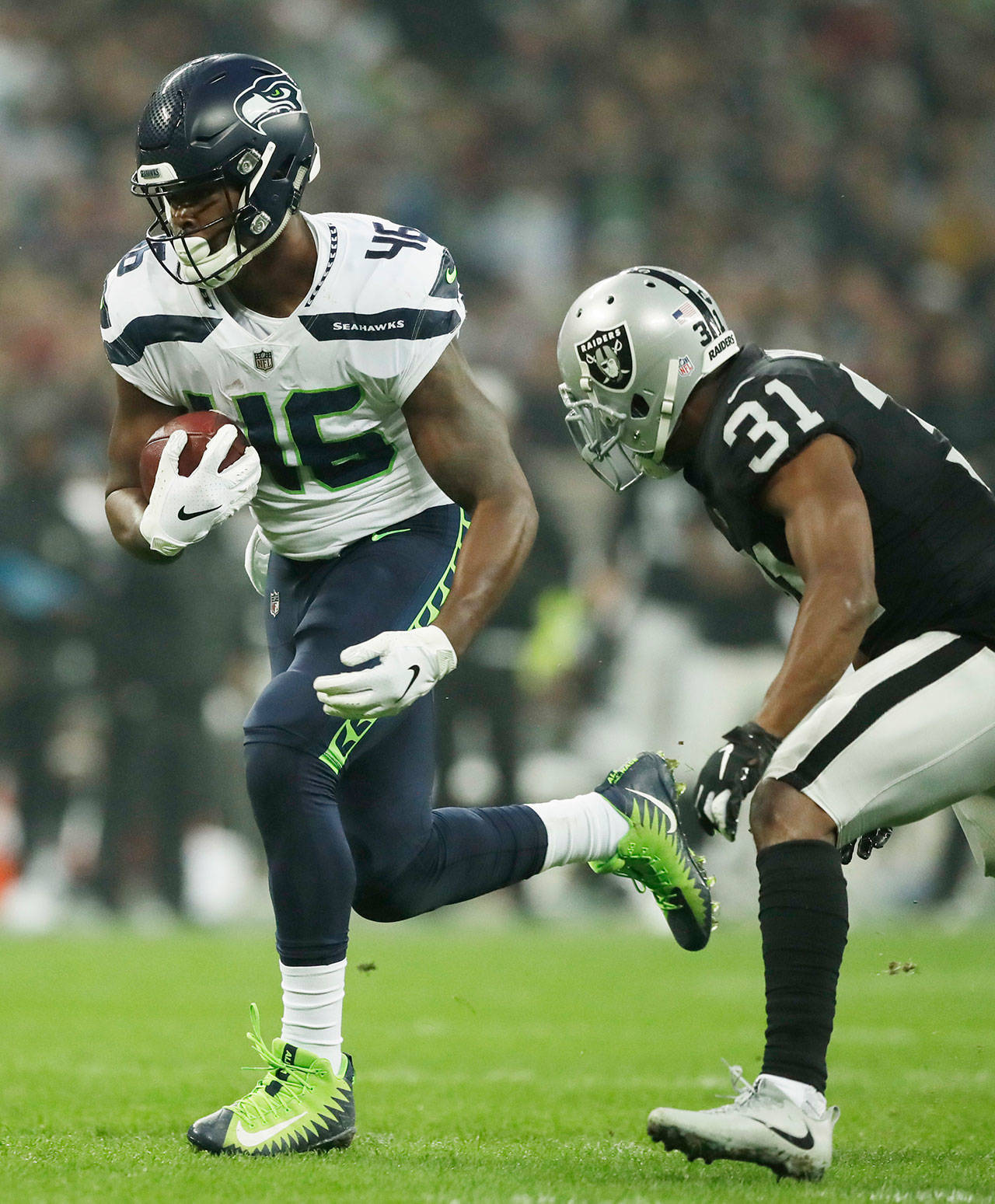 Seahawks tight end Tyrone Swoopes runs with the ball during the first half of a game against Raiders on Oct. 14, 2018, at Wembley stadium in London. (AP Photo/Matt Dunham)